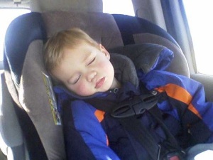 Toddler asleep in car seat