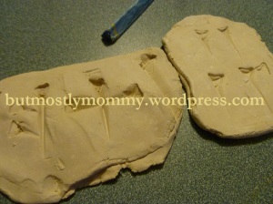 Our finished clay tablets and our very-authentic-looking stylus
